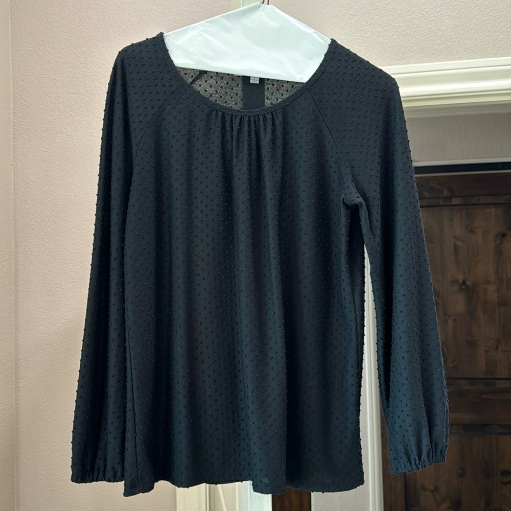 Very good condition, black pullover blouse from Olive and Rose.